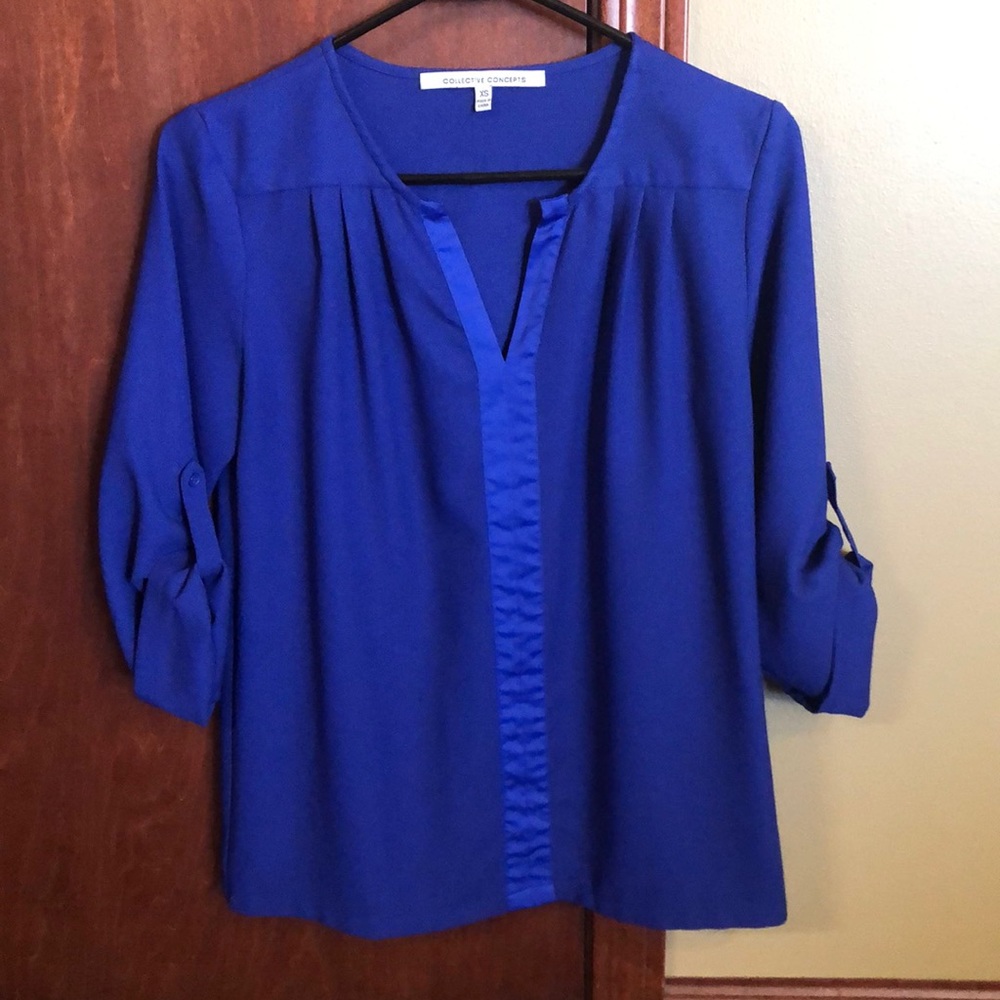 Vibrant blue blouse.